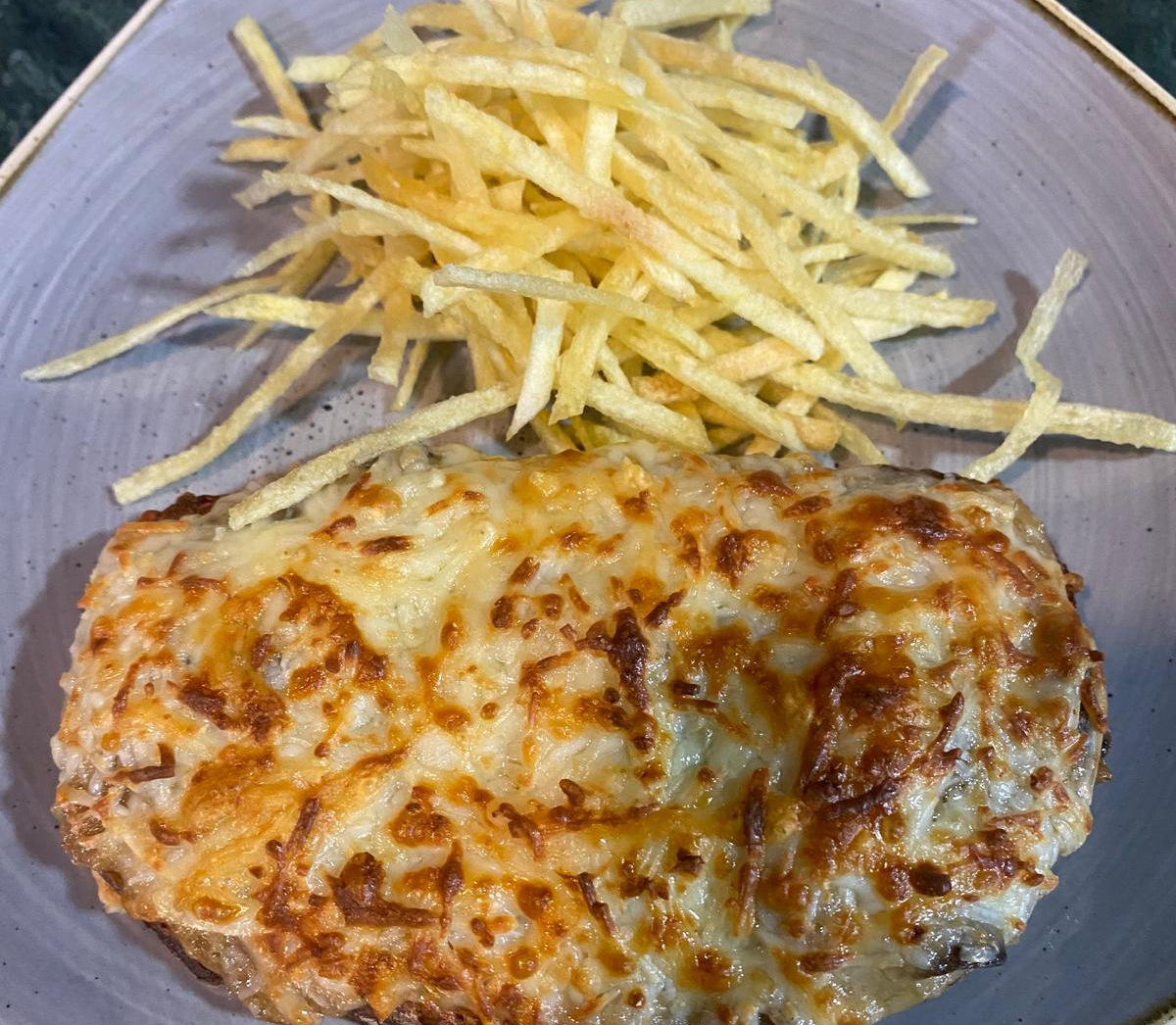 Tosta de champiñón gratinada